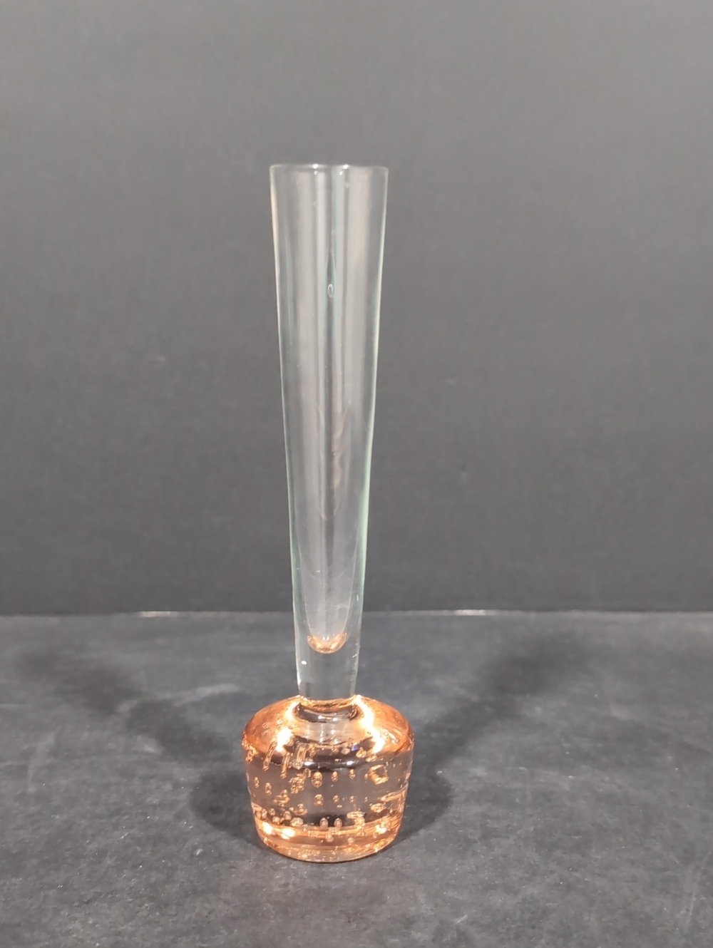 VGT,Bud Vase with A Controlled Bubble Glass Base In A Peach Color.